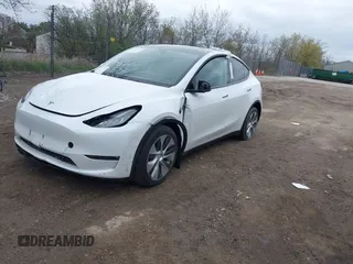 2022 Tesla Model Y Long Range with VIN 7SAYGDEE1NF421098, listed as a IAAI auction lot 42177555 with 55,855 mi miles and . Bid and sale history available at carsss.com. Image 20.