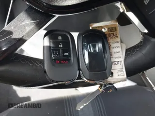2023 Honda Civic Sport with VIN 19XFL2H80PE022752, listed as a IAAI auction lot 42077694 with 25,939 mi miles and . Bid and sale history available at DreamBid. Image 11.