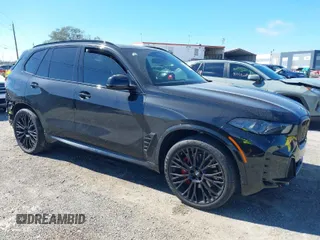 2025 BMW X5 sDrive40i with VIN 5UX13EU01S9W88784, listed as a IAAI auction lot 41631766 with 12,805 mi miles. Bid and sale history available at carsss.com. Image 1.