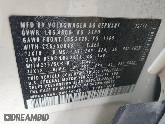 2013 Volkswagen Tiguan SE with VIN WVGAV3AX1DW574009, listed as a Copart auction lot 60936735 with 121,624 mi miles and Clean title. Bid and sale history available at DreamBid. Image 13.