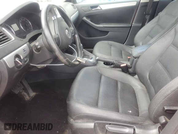 2012 Volkswagen Jetta TDI w/Premium & Nav with VIN 3VWLL7AJ6CM016111, listed as a Copart auction lot 58756965 with 152,444 mi miles and Salvage title. Bid and sale history available at DreamBid. Image 7.