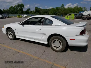 1996 Ford Mustang with VIN 1FALP4041TF206244, listed as a Copart auction lot 56311934 with 123,572 mi miles and Salvage Title. Bid and sale history available at carsss.com. Image 2.