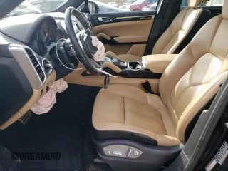 2016 Porsche Cayenne S E-Hybrid z VIN WP1AE2A29GLA17128, wystawiony jako Copart lot #87010884 z przebiegiem 130 895 mil mil oraz Szkoda całkowita • Salvage title. Historia ofert i sprzedaży dostępna na DreamBid. Obrazek 7.