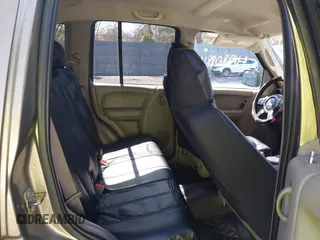 2005 Jeep Liberty Sport with VIN 1J4GL48K35W568972, listed as a IAAI auction lot 41980884 with 198,430 mi miles and . Bid and sale history available at DreamBid. Image 8.