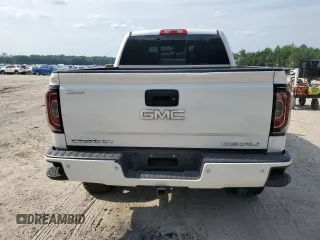 2017 GMC Sierra 1500 Denali z VIN 3GTU2PEJ2HG433669, wystawiony jako Copart lot #57460285 z przebiegiem 131 113 mil mil oraz Szkoda całkowita • Salvage title. Historia ofert i sprzedaży dostępna na DreamBid. Obrazek 6.