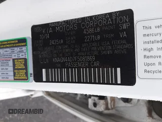 2015 Kia Optima EX with VIN KNAGN4AD7F5081869, listed as a Copart auction lot 55266585 with 106,830 mi miles and Salvage title. Bid and sale history available at DreamBid. Image 12.