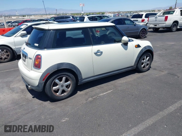 2007 MINI Hardtop with VIN WMWMF33567TU62285, listed as a IAAI auction lot 42517575 with 137,542 mi miles and . Bid and sale history available at DreamBid. Image 4.