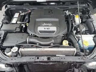 2017 Jeep Wrangler Sport z VIN 1C4AJWAG0HL644978, wystawiony jako Copart lot #56485985 z przebiegiem 104 151 mil mil oraz Szkoda całkowita • Salvage title. Historia ofert i sprzedaży dostępna na DreamBid. Obrazek 11.