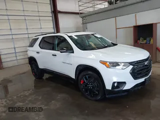 2021 Chevrolet Traverse Premier with VIN 1GNEVKKW0MJ266937, listed as a IAAI auction lot 41378033 with 34,683 mi miles. Bid and sale history available at carsss.com. Image 1.