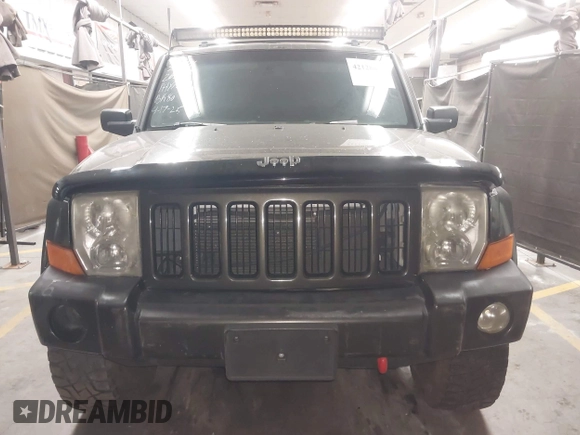 2006 Jeep Commander with VIN 1J8HG48KX6C263348, listed as a IAAI auction lot 42128039 with 208,605 mi miles and . Bid and sale history available at DreamBid. Image 13.