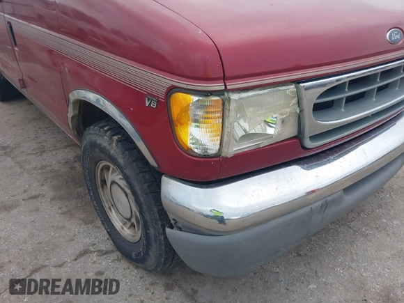 1999 Ford Econoline Cargo with VIN 1FDRE14W0XHB06565, listed as a IAAI auction lot 41496511 with 165,268 mi miles. Bid and sale history available at carsss.com. Image 6.