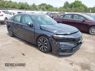 2022 Honda Civic EX with VIN JHMFE1F71NX000236, listed as a IAAI auction lot 42411801 with 55,482 mi miles and . Bid and sale history available at DreamBid. Image 1.
