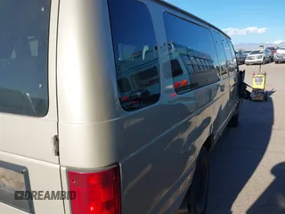 2010 Ford Econoline Passenger XL with VIN 1FBSS3BL7ADA29540, listed as a IAAI auction lot 41022591 with 208,662 mi miles. Bid and sale history available at carsss.com. Image 4.