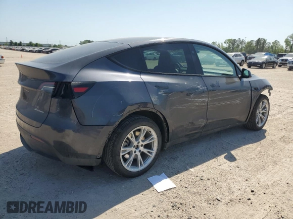 2024 Tesla Model Y Long Range with VIN 7SAYGDEE5RA282984, listed as a Copart auction lot 52388455 with 11,922 mi miles and Salvage Title. Bid and sale history available at DreamBid. Image 3.