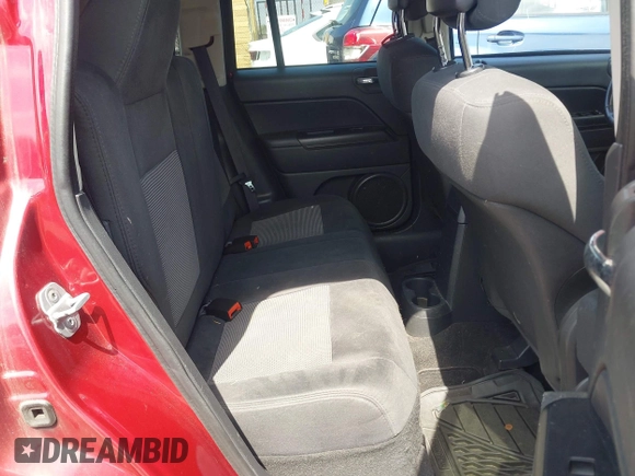 2011 Jeep Compass Latitude with VIN 1J4NT1FB8BD170401, listed as a IAAI auction lot 42094953 with 122,617 mi miles. Bid and sale history available at carsss.com. Image 8.