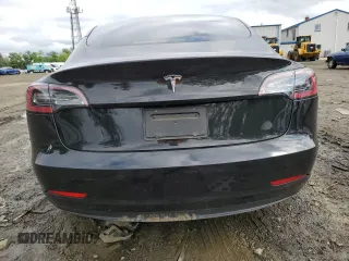 2023 Tesla Model 3 with VIN 5YJ3E1EA3PF451764, listed as a Copart auction lot 58718705 with 33,965 mi miles and Salvage title. Bid and sale history available at DreamBid. Image 6.