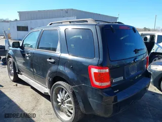 2009 Ford Escape XLT with VIN 1FMCU93G49KD15671, listed as a IAAI auction lot 41751527 with 208,697 mi miles. Bid and sale history available at carsss.com. Image 3.
