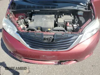 2012 Toyota Sienna LE AAS with VIN 5TDKK3DC7CS195590, listed as a Copart auction lot 57968415 with 201,732 mi miles and Salvage title. Bid and sale history available at DreamBid. Image 12.