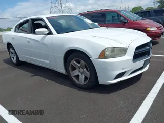 2012 Dodge Charger Police z VIN 2C3CDXAT9CH172602, wystawiony jako IAAI lot #42079392 z przebiegiem 142 559 mil mil oraz . Historia ofert i sprzedaży dostępna na DreamBid. Obrazek 1.