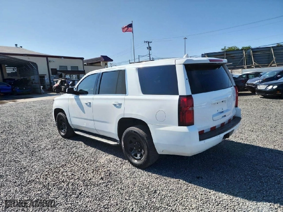 2016 Chevrolet Tahoe Commercial with VIN 1GNSKDEC1GR405102, listed as a Copart auction lot 73126294 with 185,351 mi miles and Clean Title. Bid and sale history available at carsss.com. Image 2.