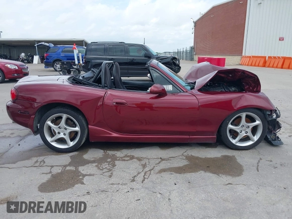 2003 Mazda MX-5 Miata Cloth with VIN JM1NB353130304852, listed as a IAAI auction lot 42145498 with Not provided miles and . Bid and sale history available at DreamBid. Image 14.