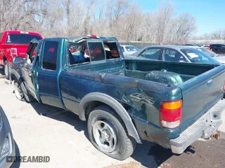 1999 Ford Ranger XLT with VIN 1FTZR15X0XPA00817, listed as a IAAI auction lot 41855947 with 215,786 mi miles. Bid and sale history available at carsss.com. Image 12.