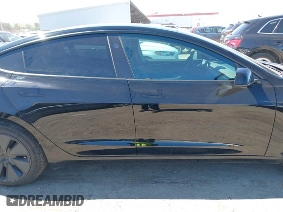 2025 Tesla Model 3 Long Range with VIN 5YJ3E1EA5SF919681, listed as a IAAI auction lot 41818042 with 2,173 mi miles and . Bid and sale history available at DreamBid. Image 14.