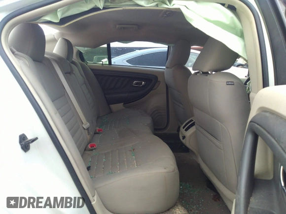2011 Ford Taurus SE with VIN 1FAHP2DW3BG113398, listed as a IAAI auction lot 41617959 with 123,706 mi miles. Bid and sale history available at carsss.com. Image 8.