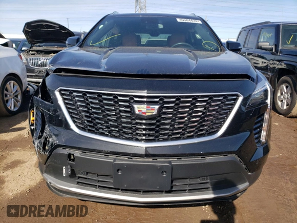 2021 Cadillac XT4 AWD Premium Luxury with VIN 1GYFZDR41MF002835, listed as a Copart auction lot 49384424 with 9,984 mi miles and Salvage Title. Bid and sale history available at carsss.com. Image 5.