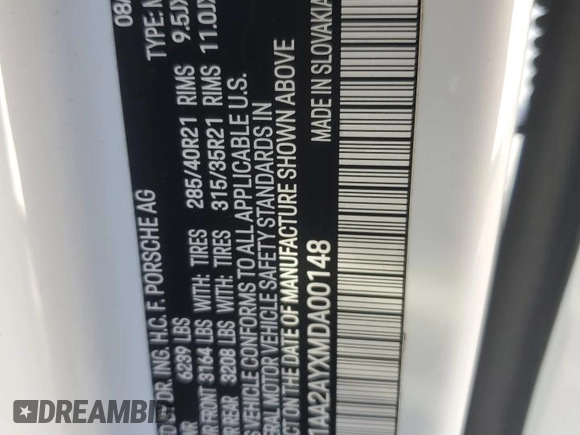 2021 Porsche Cayenne with VIN WP1AA2AYXMDA00148, listed as a Copart auction lot 52647565 with 27,977 mi miles and Salvage title. Bid and sale history available at DreamBid. Image 12.