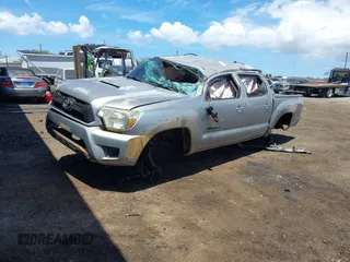 2015 Toyota Tacoma with VIN 3TMLU4ENXFM185841, listed as a IAAI auction lot 41896752 with 111,629 mi miles and . Bid and sale history available at DreamBid. Image 2.