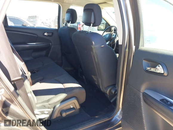 2015 Dodge Journey SE z VIN 3C4PDCAB5FT739266, wystawiony jako IAAI lot #41725086 z przebiegiem 134 109 mil mil oraz . Historia ofert i sprzedaży dostępna na DreamBid. Obrazek 8.
