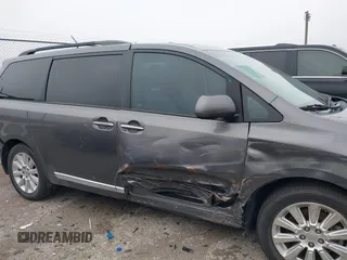 2011 Toyota Sienna XLE AAS with VIN 5TDYK3DC9BS158209, listed as a IAAI auction lot 42163526 with 107,385 mi miles and . Bid and sale history available at DreamBid. Image 14.