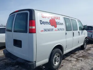 2010 GMC Savana Cargo Van with VIN 1GTZGFBA8A1172252, listed as a IAAI auction lot 41614483 with 153,172 mi miles. Bid and sale history available at carsss.com. Image 4.