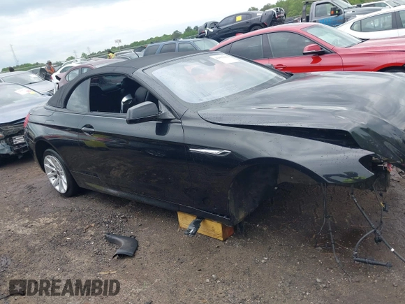 2014 BMW 6 Series 640i z VIN WBALW7C5XED595934, wystawiony jako IAAI lot #42092380 z przebiegiem Nie podano mil oraz . Historia ofert i sprzedaży dostępna na DreamBid. Obrazek 12.