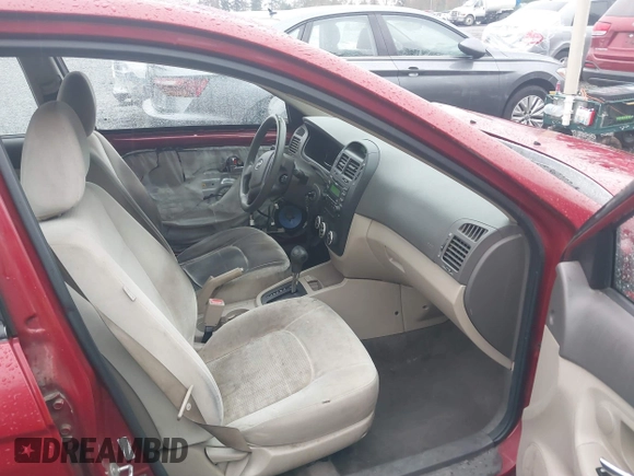 2009 Kia Spectra EX with VIN KNAFE222695621925, listed as a IAAI auction lot 40657622 with 135,647 mi miles. Bid and sale history available at carsss.com. Image 5.