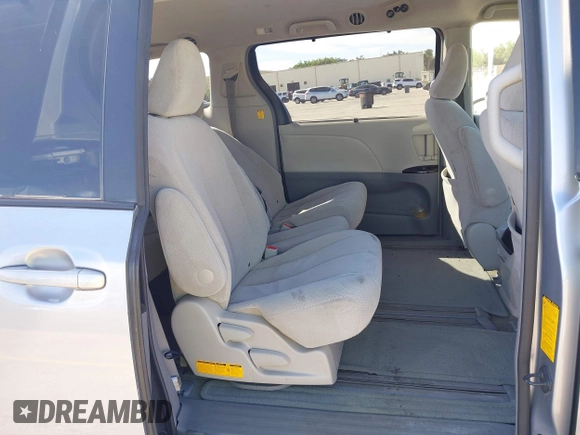 2012 Toyota Sienna LE AAS with VIN 5TDKK3DC6CS189747, listed as a IAAI auction lot 41857367 with 205,376 mi miles and . Bid and sale history available at DreamBid. Image 8.