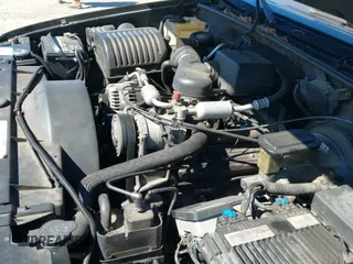 1999 Chevrolet Suburban with VIN 3GNEC16R0XG137834, listed as a IAAI auction lot 41853492 with 296,147 mi miles and . Bid and sale history available at DreamBid. Image 19.