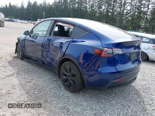 2024 Tesla Model Y Long Range z VIN 7SAYGDEEXRF128967, wystawiony jako IAAI lot #42216304 z przebiegiem 17 193 mil mil oraz . Historia ofert i sprzedaży dostępna na DreamBid. Obrazek 3.