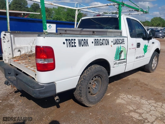 2005 Ford F-150 XL with VIN 1FTRF12W95NB42063, listed as a IAAI auction lot 41874938 with 254,029 mi miles. Bid and sale history available at carsss.com. Image 4.