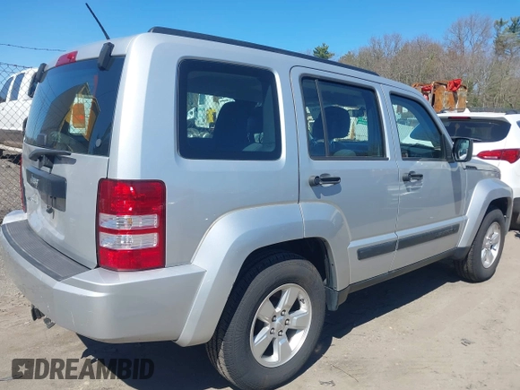 2011 Jeep Liberty Sport with VIN 1J4PN2GK9BW575064, listed as a IAAI auction lot 42062056 with 152,693 mi miles. Bid and sale history available at carsss.com. Image 4.