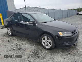 2014 Volkswagen Jetta Comfortline с VIN 3VWDL7AJ2EM366052, выставлен на аукционе Copart как лот 69010344 с пробегом 210 092 миль миль и Списание • Salvage title. История ставок и продаж доступна на DreamBid. Изображение 4.
