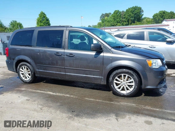 2015 Dodge Grand Caravan SXT with VIN 2C4RDGCG4FR631362, listed as a IAAI auction lot 42027066 with 149,599 mi miles and . Bid and sale history available at DreamBid. Image 13.