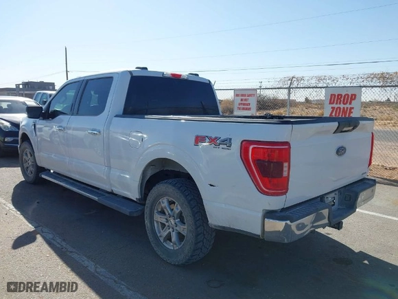 2021 Ford F-150 XL with VIN 1FTFW1E86MFC72651, listed as a IAAI auction lot 41840341 with 100,645 mi miles. Bid and sale history available at carsss.com. Image 3.