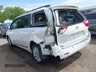 2015 Toyota Sienna Limited with VIN 5TDDK3DC9FS119513, listed as a IAAI auction lot 42290386 with 210,948 mi miles and . Bid and sale history available at DreamBid. Image 3.