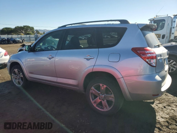 2011 Toyota RAV4 Sport z VIN JTMRF4DV5B5037697, wystawiony jako Copart lot #82259164 z przebiegiem 99 215 mil mil oraz Szkoda całkowita • Salvage title. Historia ofert i sprzedaży dostępna na DreamBid. Obrazek 2.
