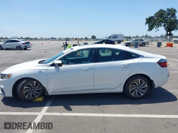 2019 Honda Insight Touring z VIN 19XZE4F99KE027245, wystawiony jako IAAI lot #42278692 z przebiegiem 106 184 mil mil oraz . Historia ofert i sprzedaży dostępna na DreamBid. Obrazek 14.