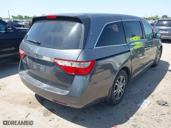 2012 Honda Odyssey EX with VIN 5FNRL5H49CB139262, listed as a IAAI auction lot 42024256 with 124,695 mi miles. Bid and sale history available at carsss.com. Image 4.