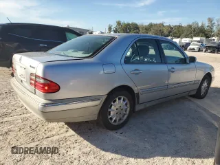 2002 Mercedes-Benz E-Class with VIN WDBJF82J92X067535, listed as a Copart auction lot 82759874 with 193,765 mi miles and Salvage Title. Bid and sale history available at carsss.com. Image 3.