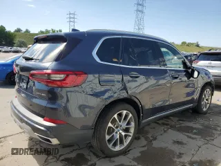 2020 BMW X5 xDrive40i with VIN 5UXCR6C06LLL75359, listed as a Copart auction lot 60897885 with 66,631 mi miles and Salvage title. Bid and sale history available at DreamBid. Image 3.